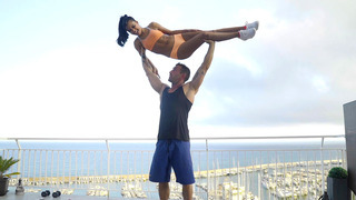 Apolonia Lapiedra and her private trainer are working out on the rooftop