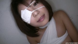 Bandaged Japanese girl Azumi Harusaki gives blowjob